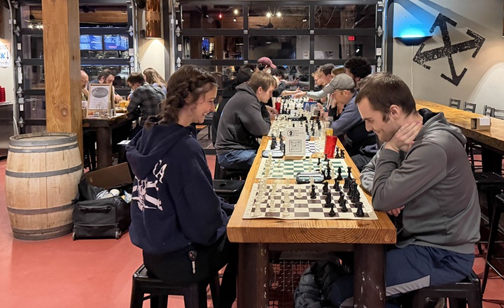 Loren S and Joey S face-off in a friendly game on the new table-layout at Crux
