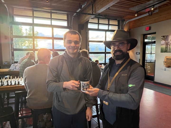 Joey S receives an honorary Holiday Grand-Prix runner-up trophy from Dean C