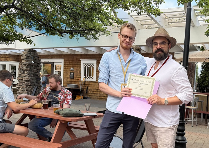 Dean C receives the Rollercoaster Award from Zach C