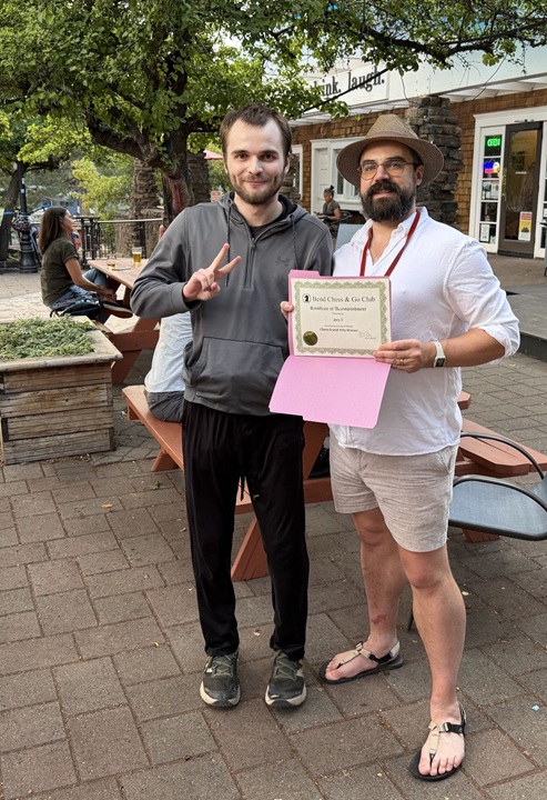 Joey S receives recognition for his Championship Quad-winning run from Dean C